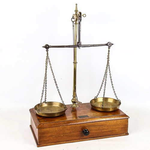 285 - Victorian brass balance scales, on mahogany base with drawer under and weights, by V H Marsden & Co ... 