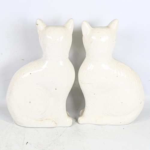 294 - A rare pair of 19th century Staffordshire Pottery seated cats, height 34cm