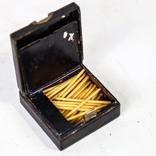 301 - A Victorian Asprey & Sons leather and brass-covered matchbox, with brass carrying handle and striker... 