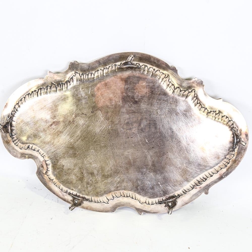 311 - WMF - electroplate tea tray with shaped and scrolled relief cast surround, length 47cm