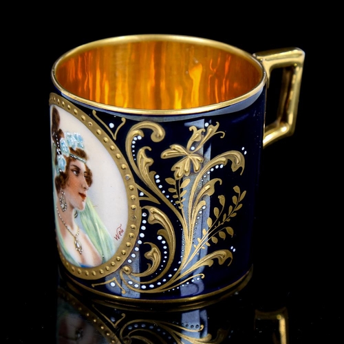 344 - A Vienna porcelain cabinet cup, with painted panel Bloni in gilded surround, height 6cm