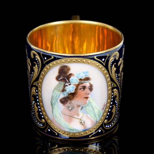 344 - A Vienna porcelain cabinet cup, with painted panel Bloni in gilded surround, height 6cm