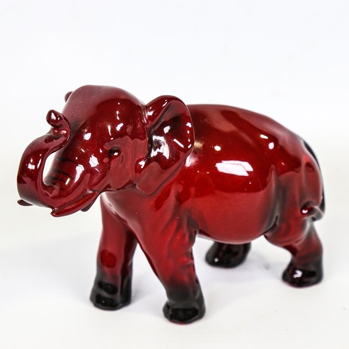 348 - Royal Doulton Flambe elephant, signed Noke, length 15cm