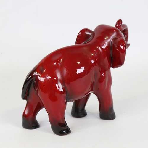 348 - Royal Doulton Flambe elephant, signed Noke, length 15cm