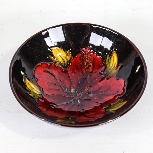 352 - MOORCROFT POTTERY - Hibiscus pattern bowl, diameter 14cm, original label under base