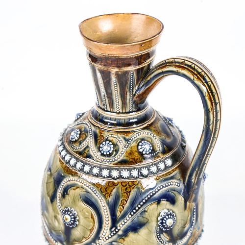 357 - Doulton Lambeth stoneware ewer, relief moulded decoration and incised leaves, dated 1876, height 21c... 