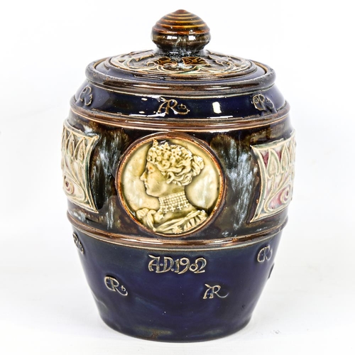 358 - Royal Doulton 1902 commemorative stoneware tobacco jar and cover, relief moulded decoration, height ... 