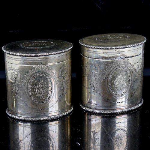 360 - A pair of 19th century electroplate oval tea caddies, with engraved decoration, height 9cm