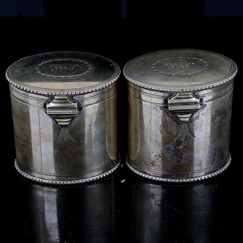 360 - A pair of 19th century electroplate oval tea caddies, with engraved decoration, height 9cm