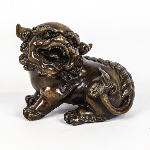 362 - A Chinese patinated bronze Dog of Fo, length 8.5cm