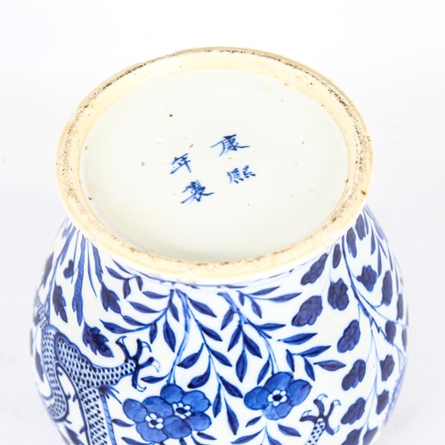 248 - A Chinese blue and white dragon vase, with 4 character marks to base, height 18cm