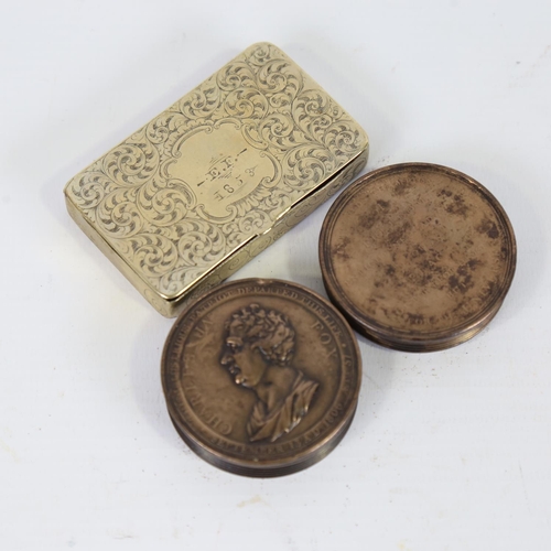 29 - A 19th century engraved brass snuffbox dated 1853, length 7cm, and a circular snuffbox with Charles ... 