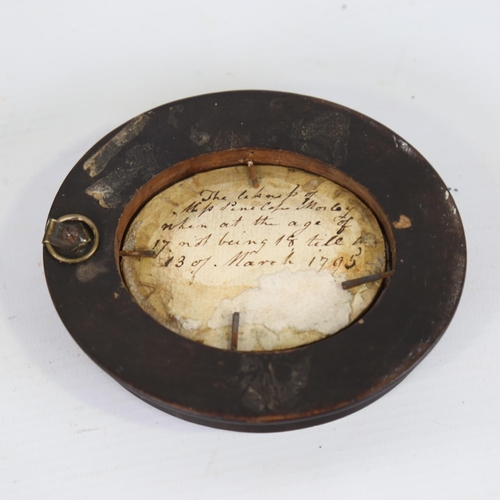 35 - A miniature watercolour on ivory, inscribed verso 