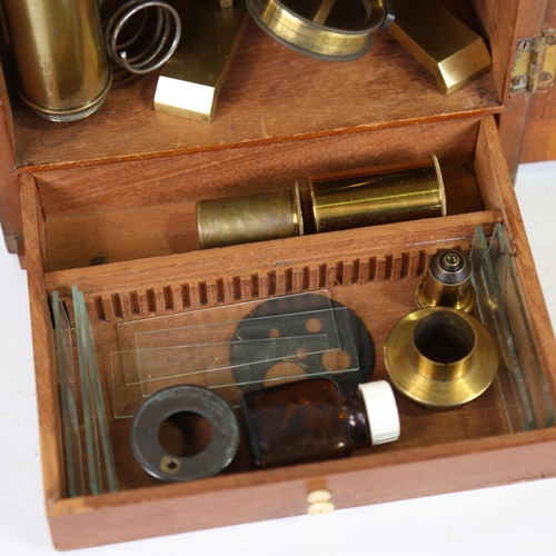 63 - A brass monocular student's microscope, by J H Steward 406 Strand London, late 19th century, origina... 