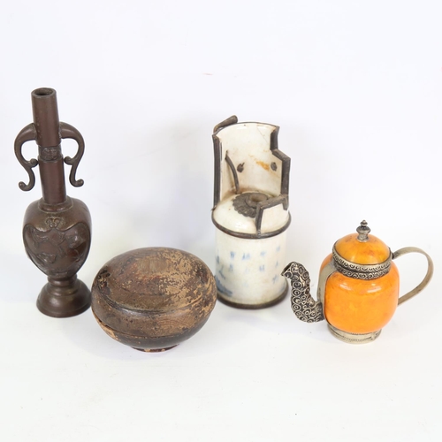 67 - A group of Oriental items, including a bronze narrow-neck vase, height 21cm, and a blue and white po... 