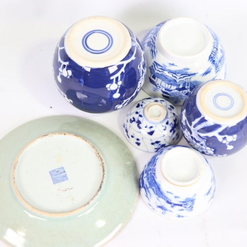 70 - A group of Oriental porcelain, including a celadon enamel plate, 18.5cm across (6)