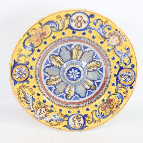 74 - 19th century French/Italian faience pottery charger, raised central boss with raised beaded surround... 