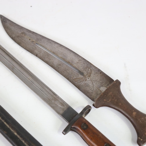 77 - A Middle Eastern dagger with steel handle, overall length 36cm, and a First World War Period sword b... 