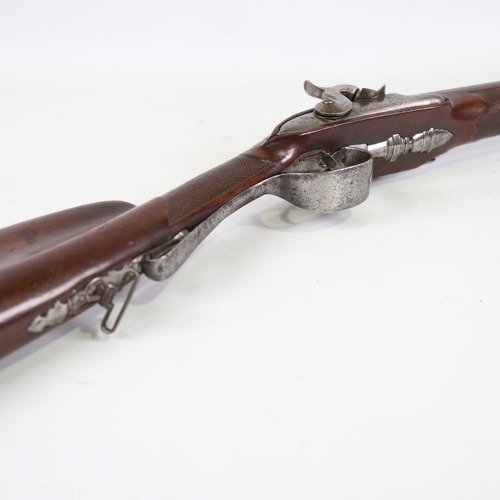 80 - An early 19th century double-barrelled percussion sporting gun, circa 1800, signed Bouillet, carved ... 