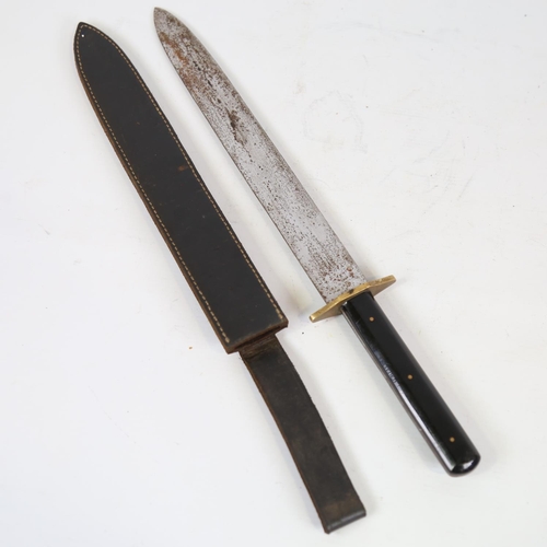84 - A mid-20th century hunting knife, with composition grips and leather sheath, blade length 30cm