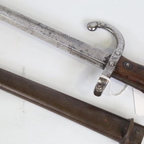 89 - A French 1874 pattern sword bayonet, Francois Louis Henry Chatelleraut, original metal scabbard