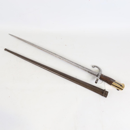 89 - A French 1874 pattern sword bayonet, Francois Louis Henry Chatelleraut, original metal scabbard