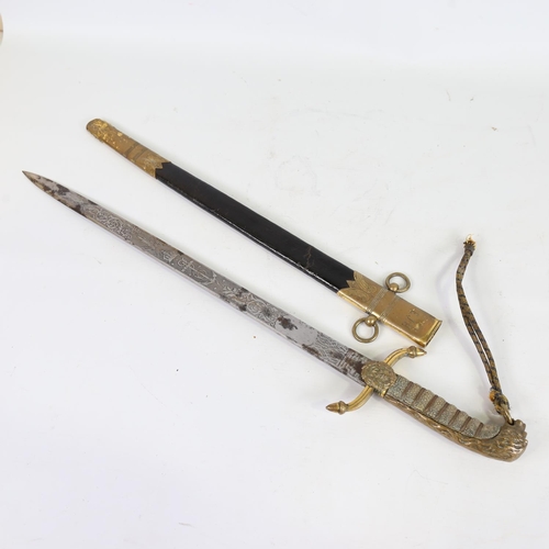 90 - A Victorian Navy Officer's dirk, gilt-brass hilt with shagreen grips, engraved blade with VR cypher ... 