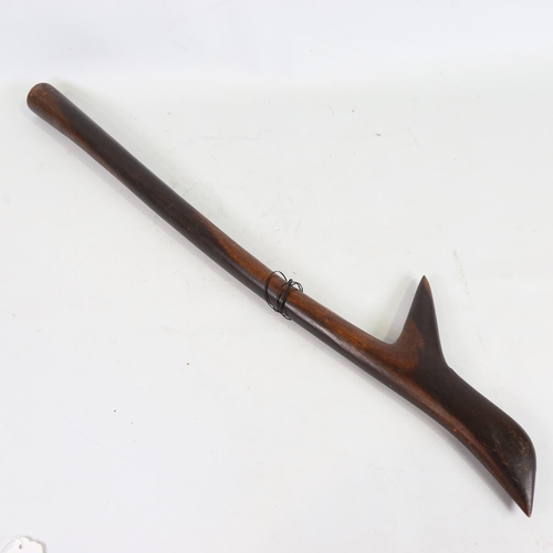 92 - An Aboriginal hardwood throwing club, probably early 20th century, length 68cm