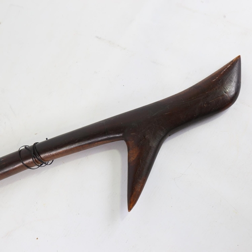 92 - An Aboriginal hardwood throwing club, probably early 20th century, length 68cm