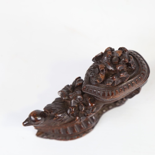 18 - A 19th century French carved and stained wood shoe design novelty box, with bird mount, length 11cm