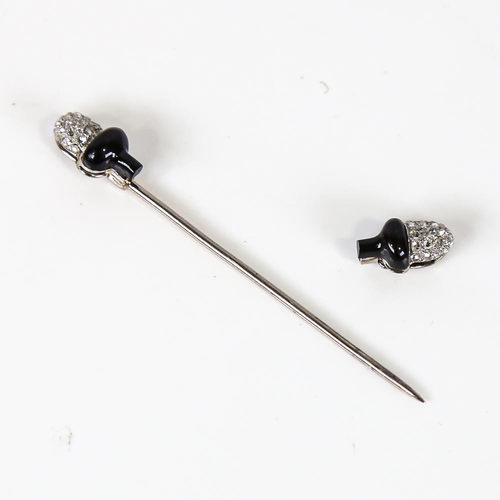 575 - A French Art Deco onyx and diamond acorn jabot pin, unmarked white metal settings with rose-cut diam... 