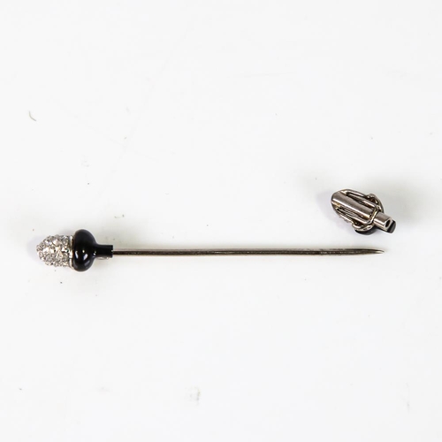 575 - A French Art Deco onyx and diamond acorn jabot pin, unmarked white metal settings with rose-cut diam... 