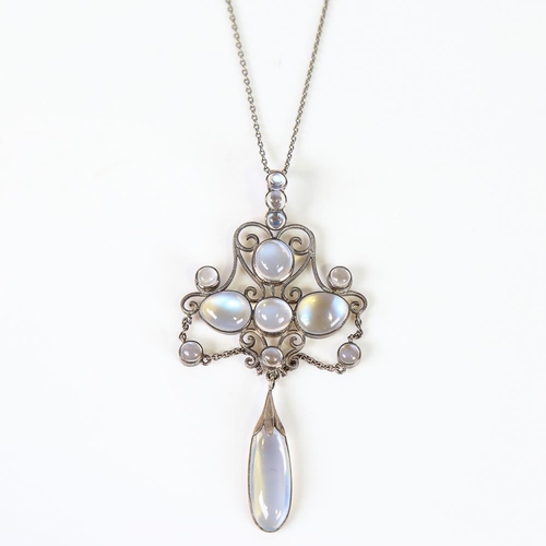 577 - An early 20th century Arts and Crafts Continental moonstone pendant necklace, unmarked white metal w... 