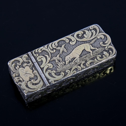 582 - A 19th century unmarked silver combination snuffbox/Vesta case, rectangular form with raised gilded ... 