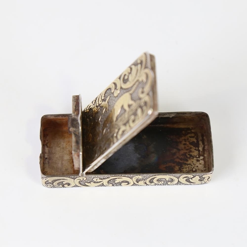 582 - A 19th century unmarked silver combination snuffbox/Vesta case, rectangular form with raised gilded ... 