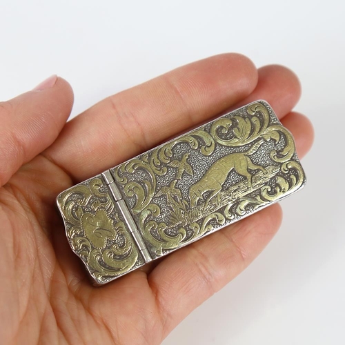 582 - A 19th century unmarked silver combination snuffbox/Vesta case, rectangular form with raised gilded ... 