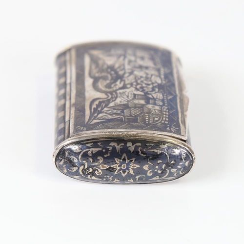 584 - A Russian silver and niello snuffbox, cushion form with eagle cityscape and floral decoration, 6.5cm... 