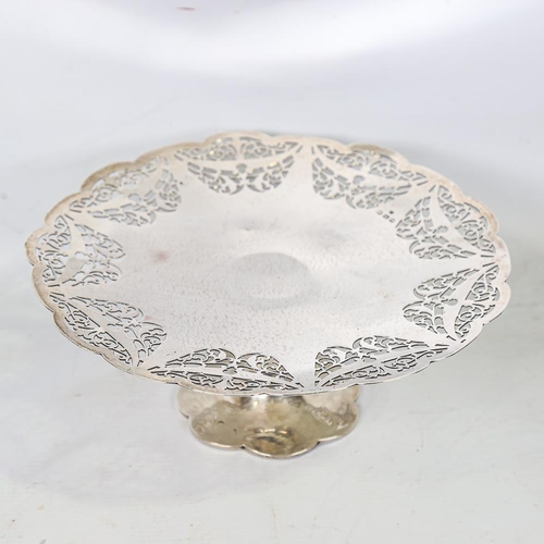 585 - A George V silver pedestal cake stand, pierced Adams style and foliate decoration, by Charles S Gree... 