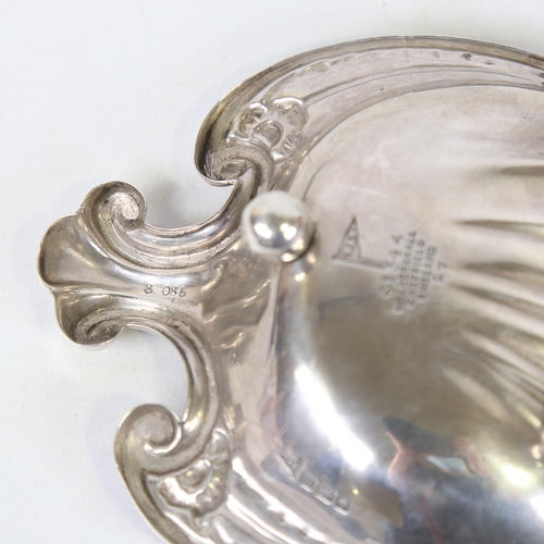 589 - A George V Art Nouveau silver shell sweetmeat dish, relief embossed decoration, by Walker & Hall, ha... 