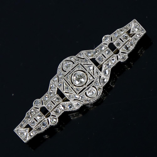 590 - An Art Deco platinum 18ct white gold and diamond geometric panel brooch, in fitted Tessiers Ltd case... 