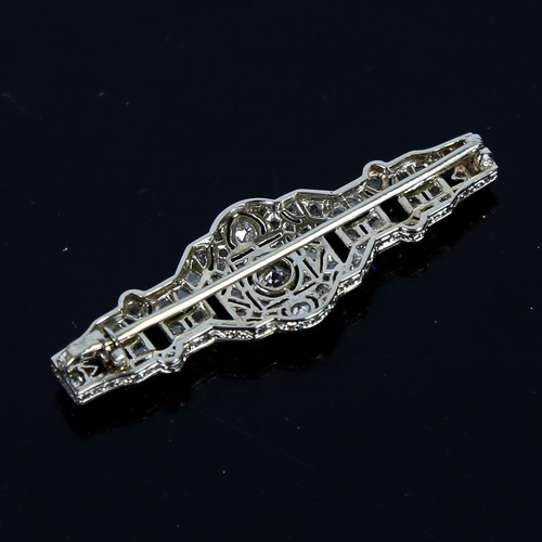 590 - An Art Deco platinum 18ct white gold and diamond geometric panel brooch, in fitted Tessiers Ltd case... 