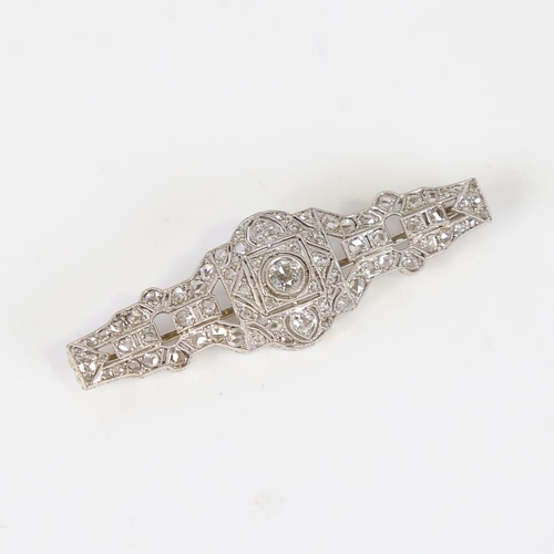 590 - An Art Deco platinum 18ct white gold and diamond geometric panel brooch, in fitted Tessiers Ltd case... 