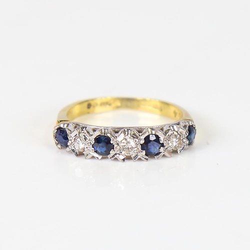 595 - A late 20th century 18ct gold 7-stone sapphire and diamond half hoop ring, set with round-cut sapphi... 