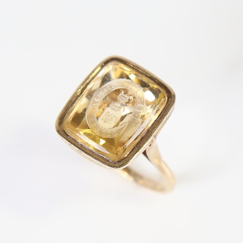 596 - A large Antique 9ct gold citrine seal ring, with garter motto 