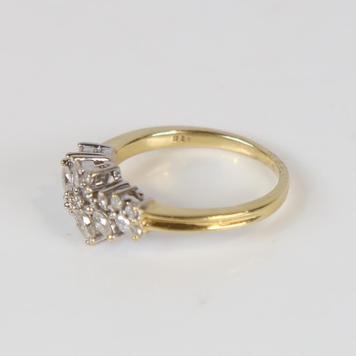 603 - A modern 18ct gold diamond cluster dress ring, set with marquise and round brilliant-cut diamonds, t... 