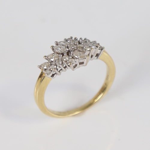 603 - A modern 18ct gold diamond cluster dress ring, set with marquise and round brilliant-cut diamonds, t... 