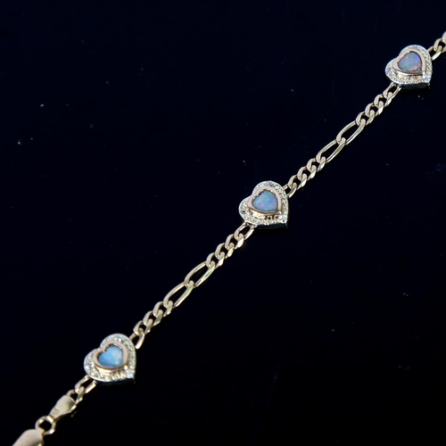 604 - A modern 9ct gold opal and cubic zirconia heart bracelet, each heart panel separated by figaro links... 