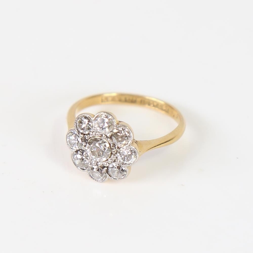 605 - An Antique 18ct gold diamond cluster flowerhead ring, set with old European-cut diamonds, total diam... 