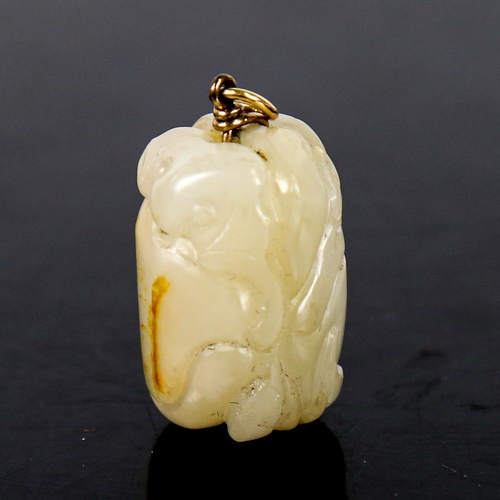 606 - A Chinese carved and polished jade peach fruit pendant, with unmarked yellow metal wirework bale, he... 