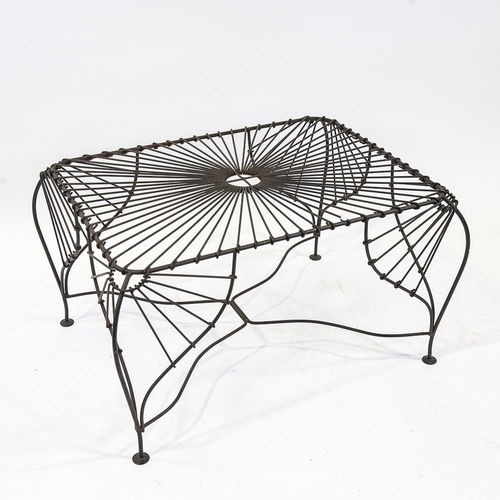 2097 - A 1980s wrought-wire frame table of organic form, height 47cm, length 78cm